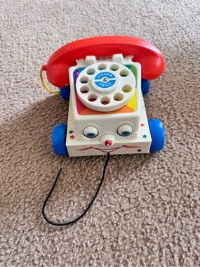 Fisher-Price Red Handset Classic Pull-Along Phone with Blue Wheels